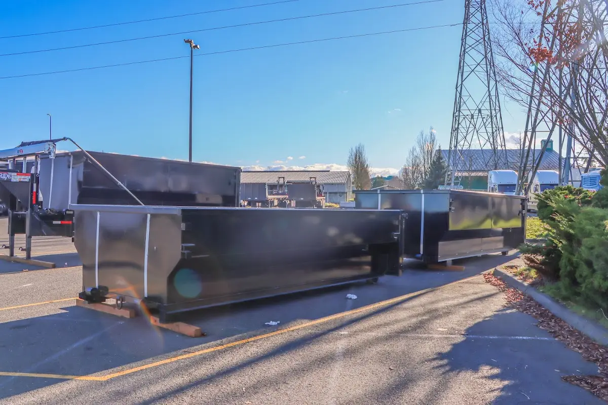 Roll-off dumpster ready for waste disposal at job site for Concrete Dumpster Rental in Hobbs